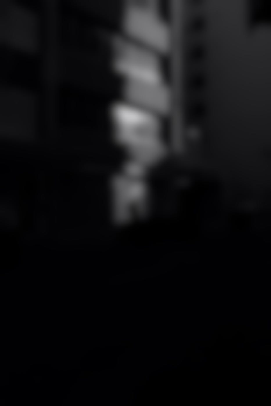 A solitary man waling the dark streets