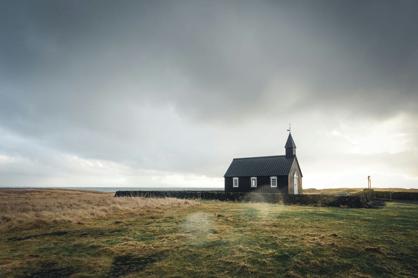 A small church in an open field