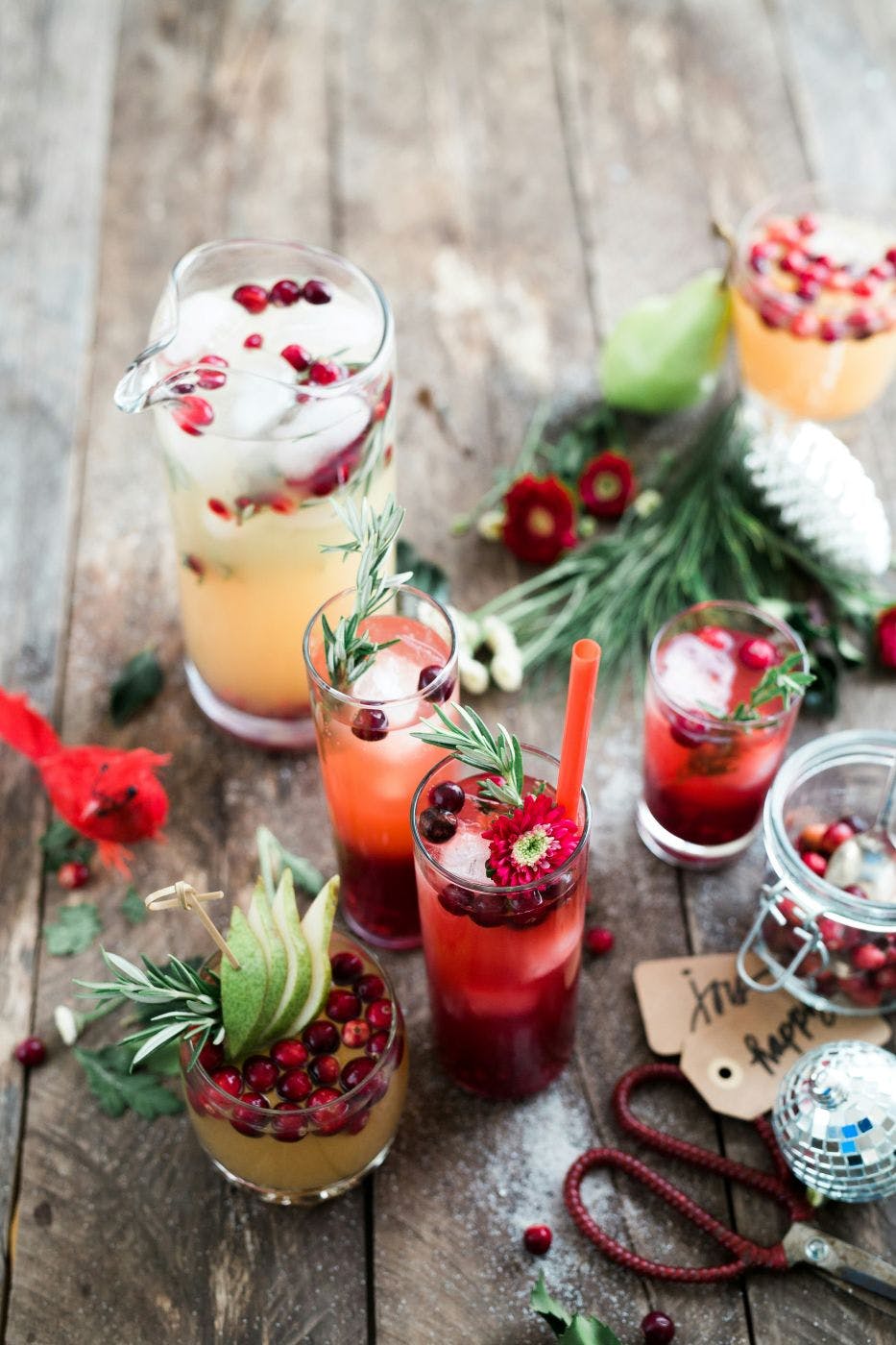 Christmas themed cocktails on a wood table