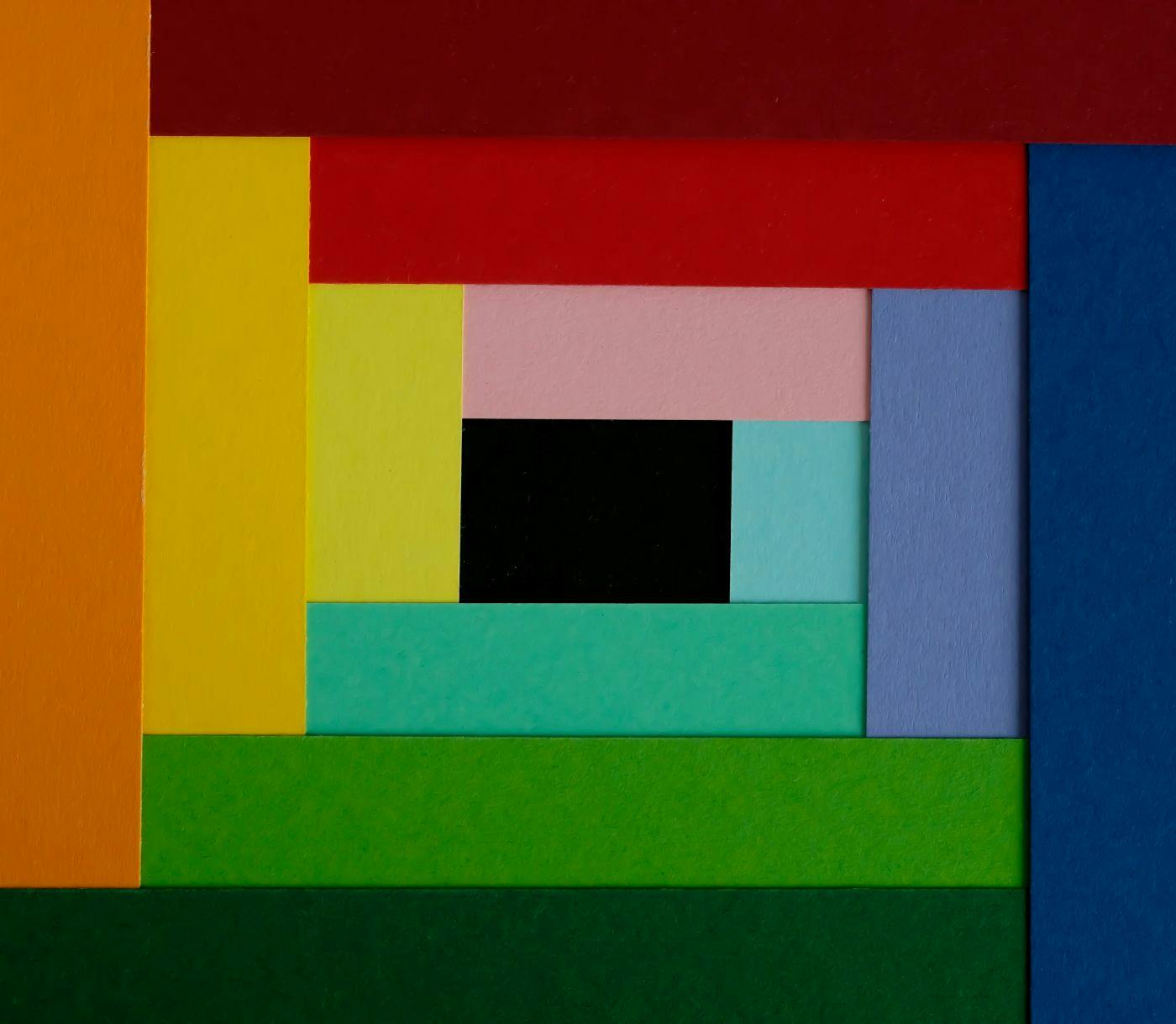 Strips of colored paper in a square