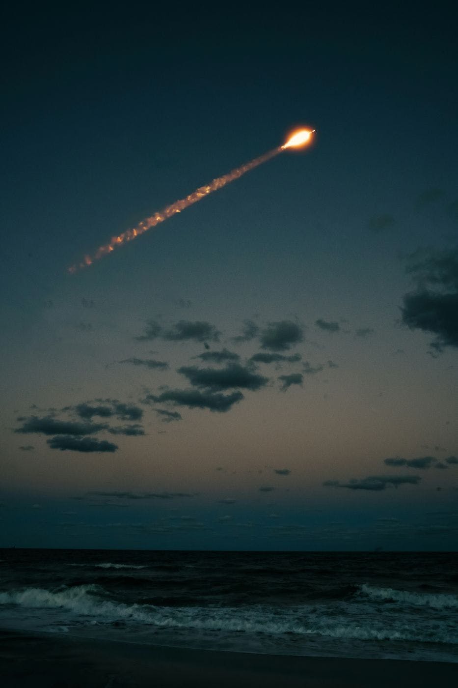 A rocket launched over the ocean