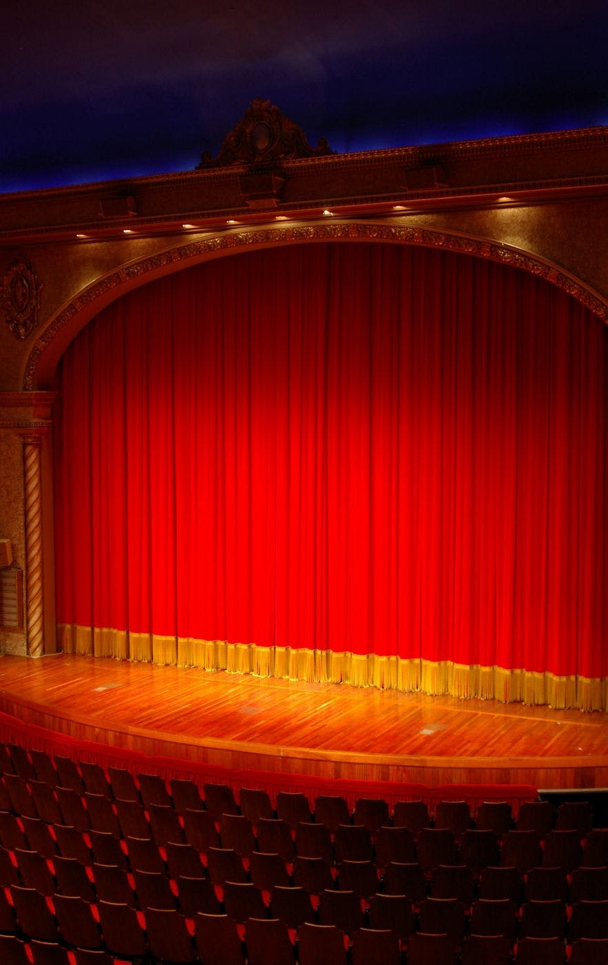 Red and yellow grand drape on a stage