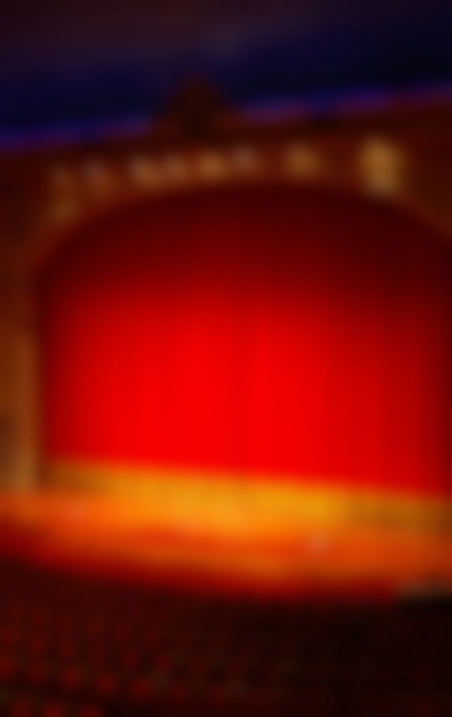 Red and yellow grand drape on a stage