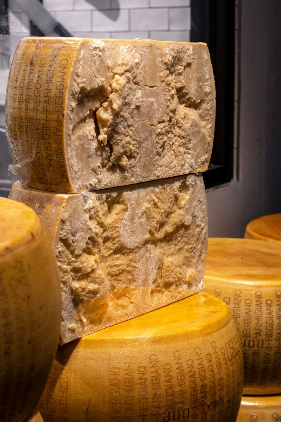 A stack of Parmigiano Reggiano cheese