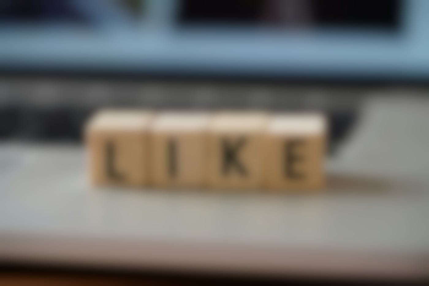 Blocks with letter spelling out LIKE