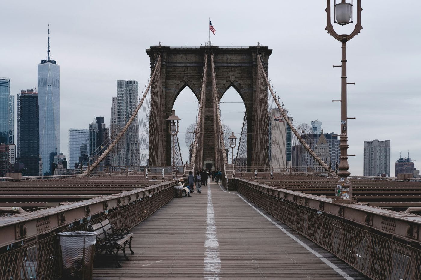 People walking over a bridge