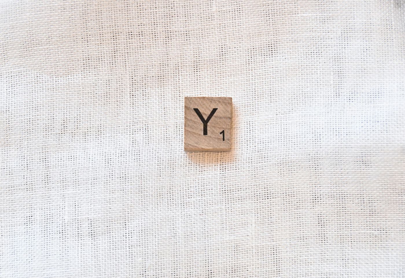 A Scrabble tile, letter Y