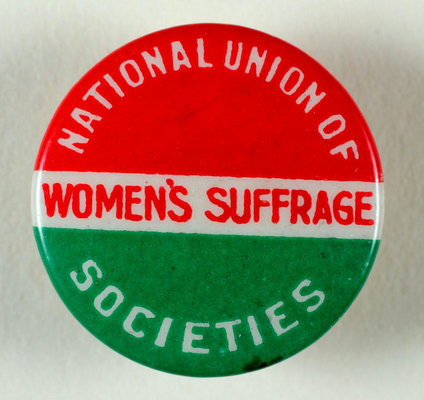 A red, white and green Women's Suffrage button