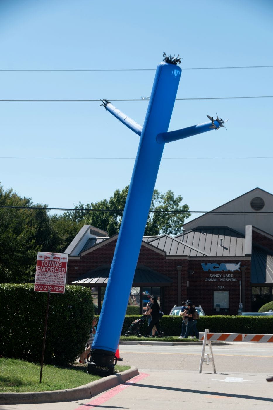 A giant blue inflatable tube man