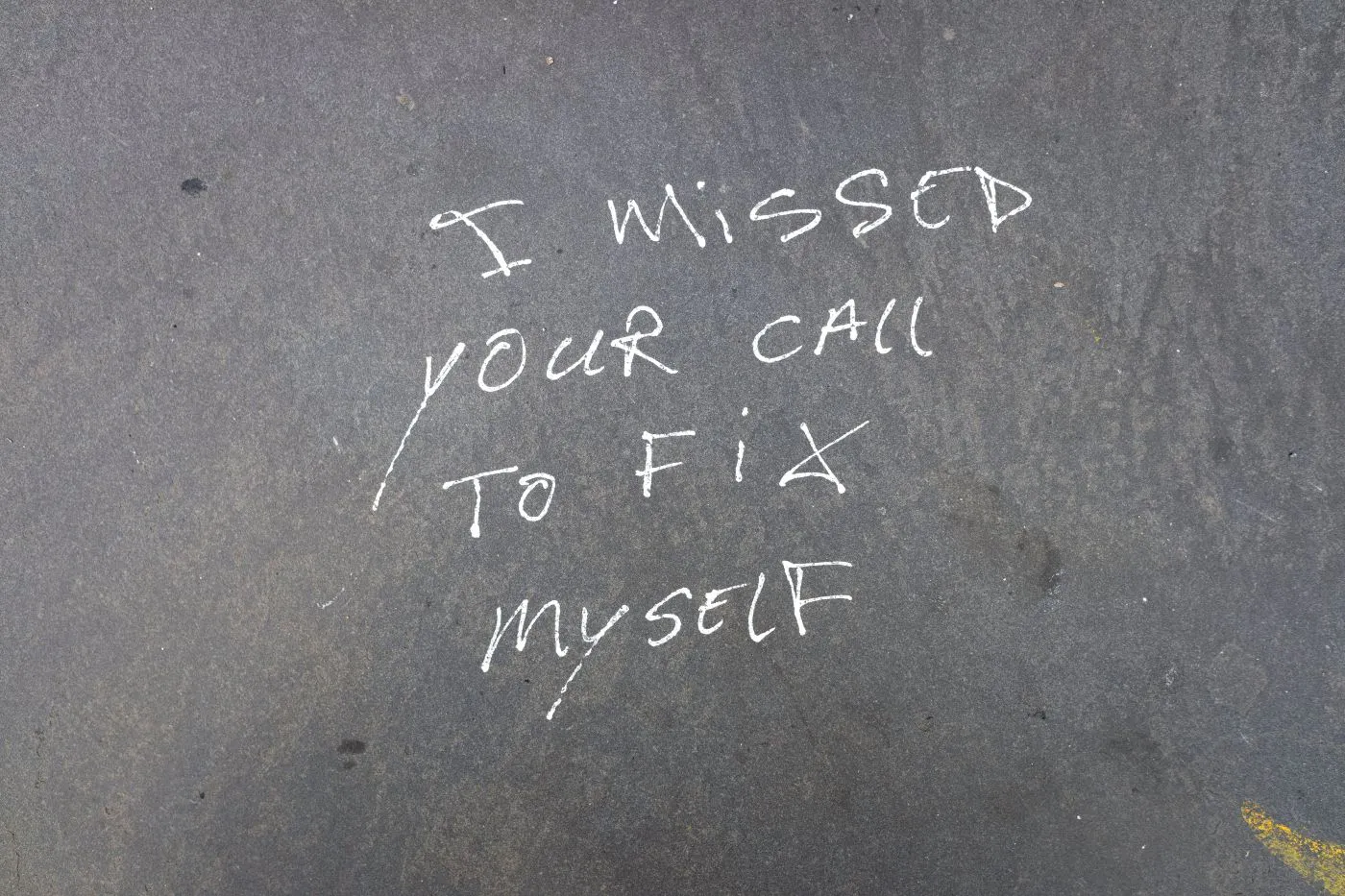 I Missed Your call to fix Myself, chalked on a sidewalk