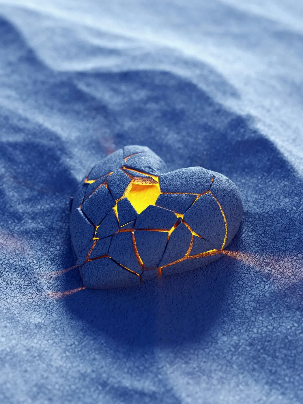 A blue heat shaped stone, cracked with yellow light inside