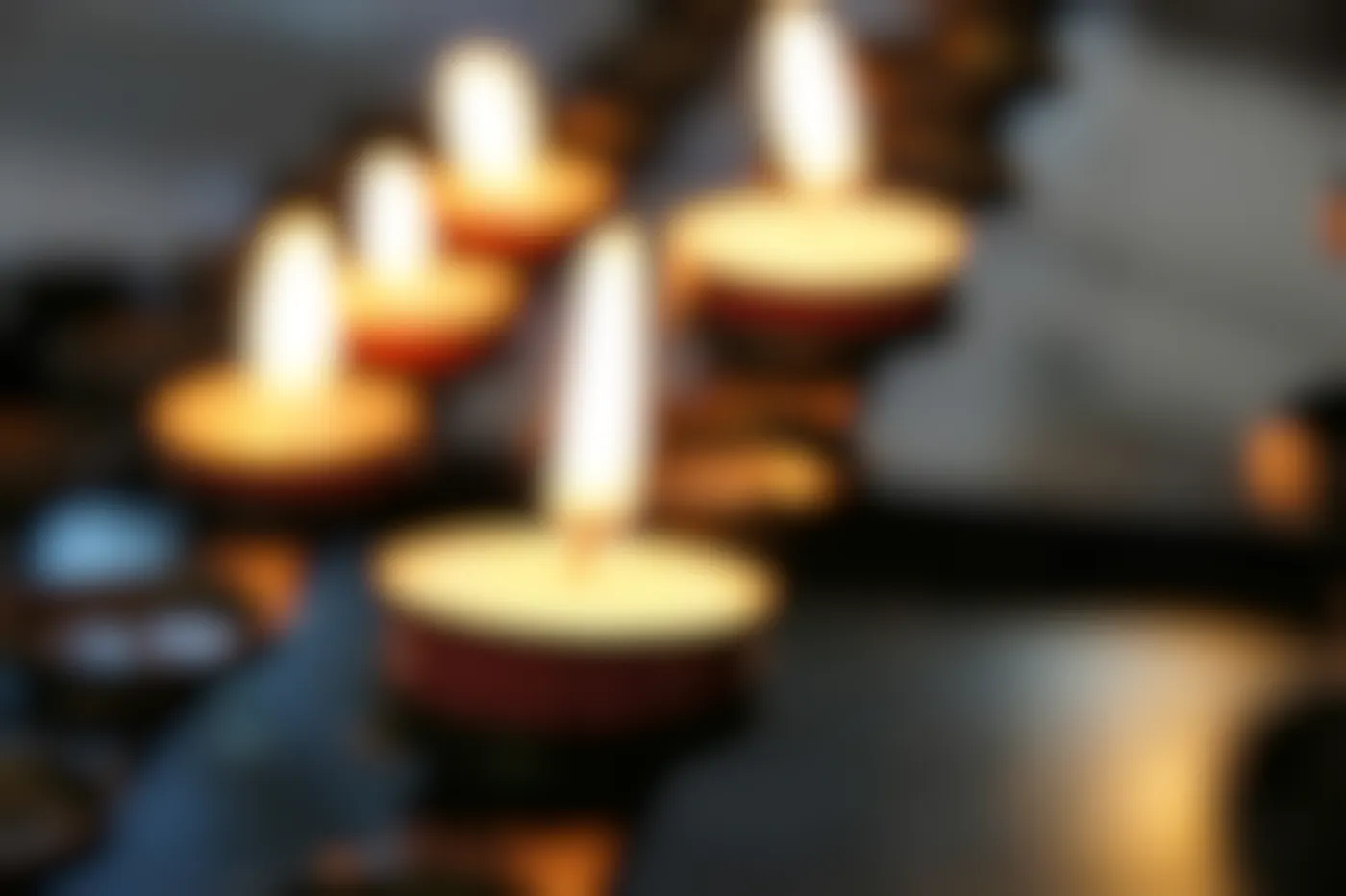 Lit candles in a church