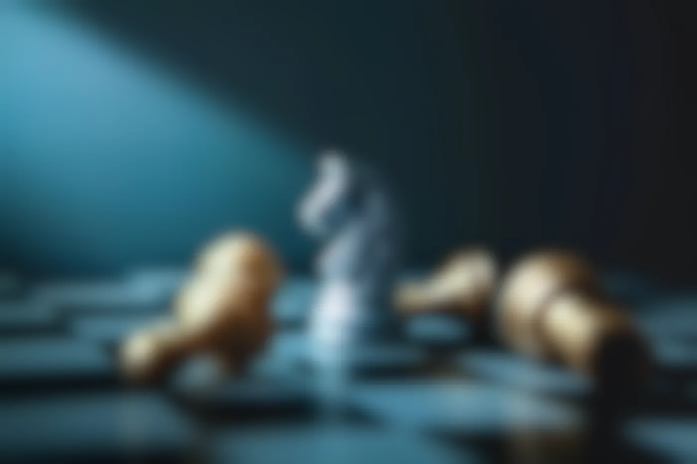 A white knight chess piece surrounded by three toppled pawns and one toppled Rook