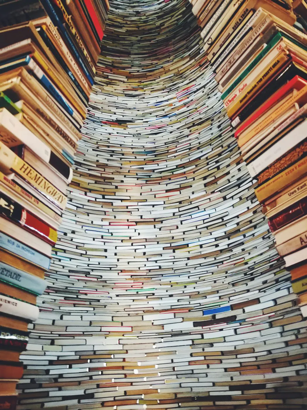 Low angle shot of a huge stack of books
