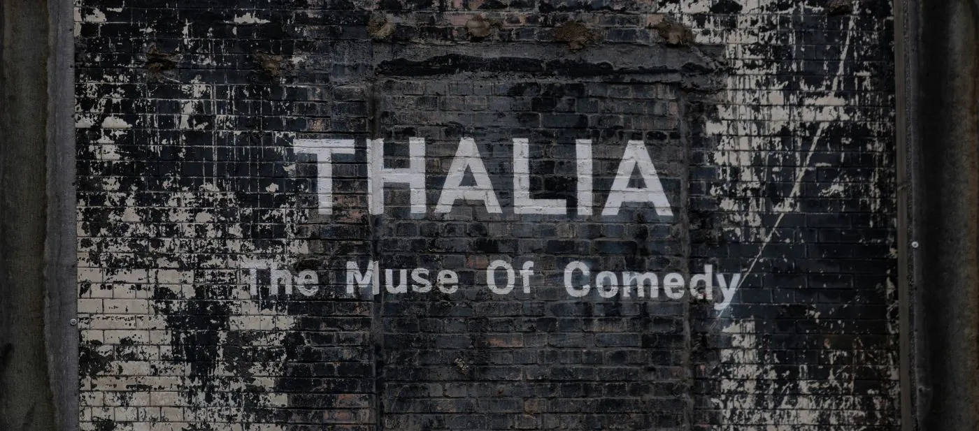 Thalia The Muse of Comedy painted on a wall