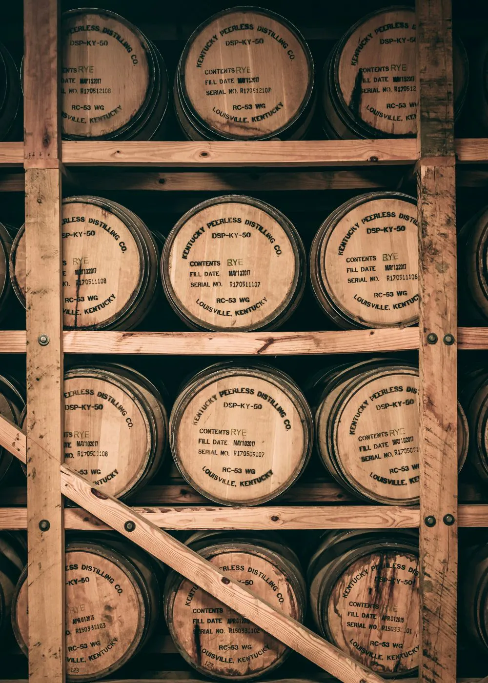 bourbon barrels on a shelf