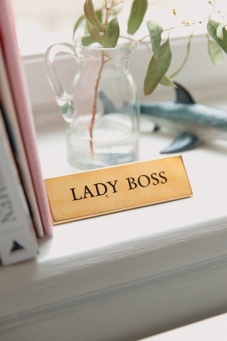 a name plate reading Lady Boss