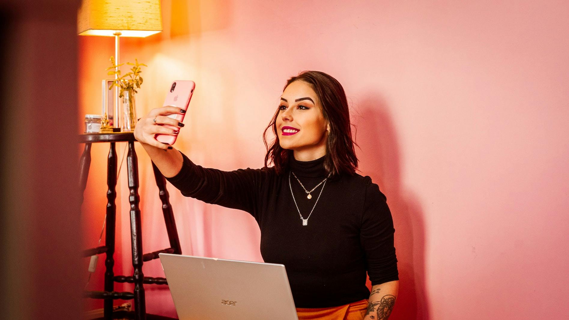 young woman taking a selfie