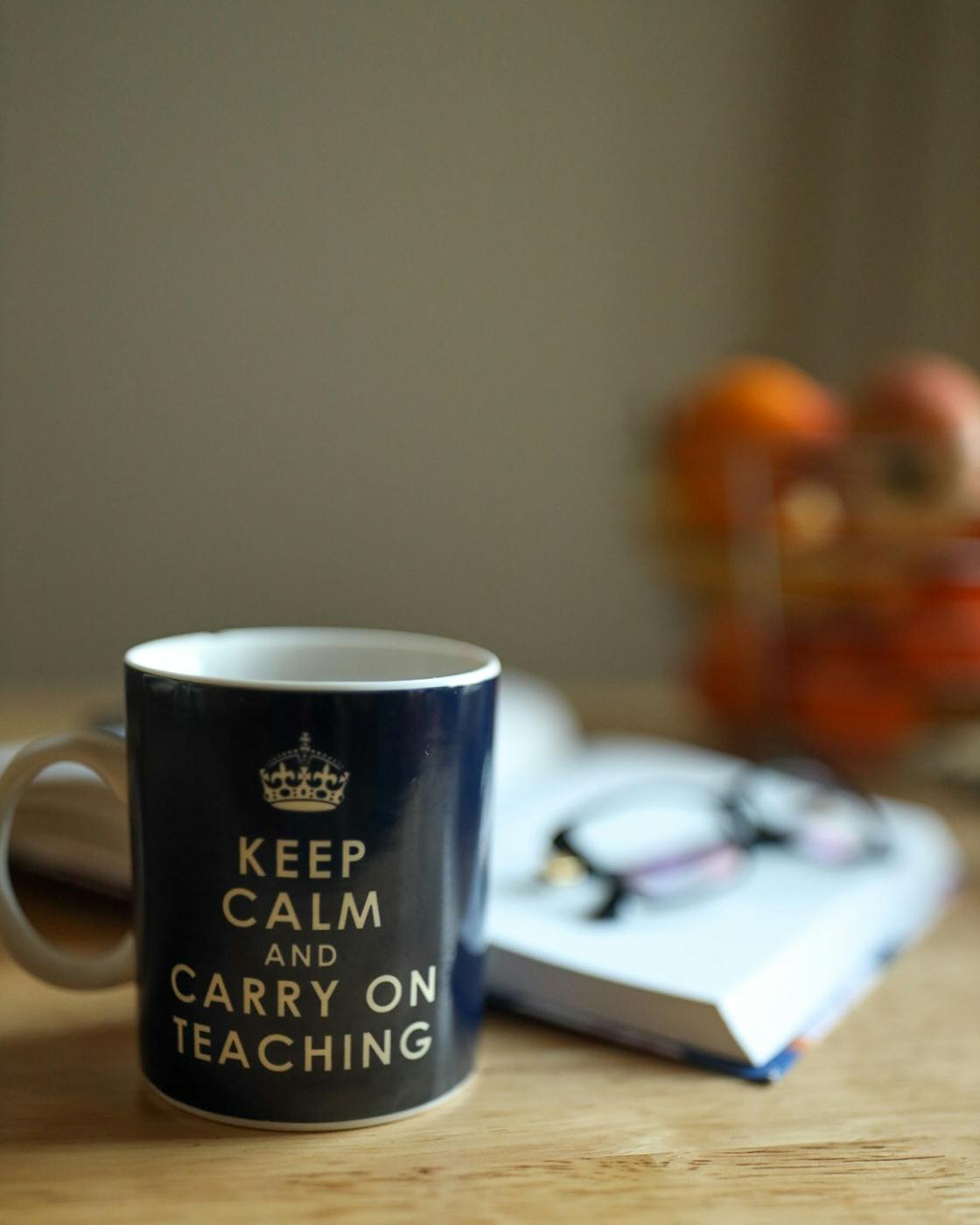  coffee mug with Keep Calm and Carry On Teaching on it