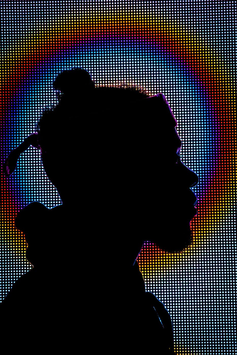 The silhouette of a man against a digital background