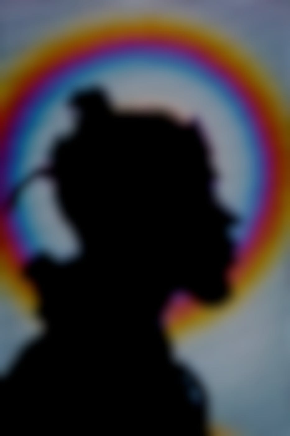 The silhouette of a man against a digital background