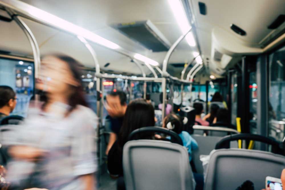 A crowded and blury bus