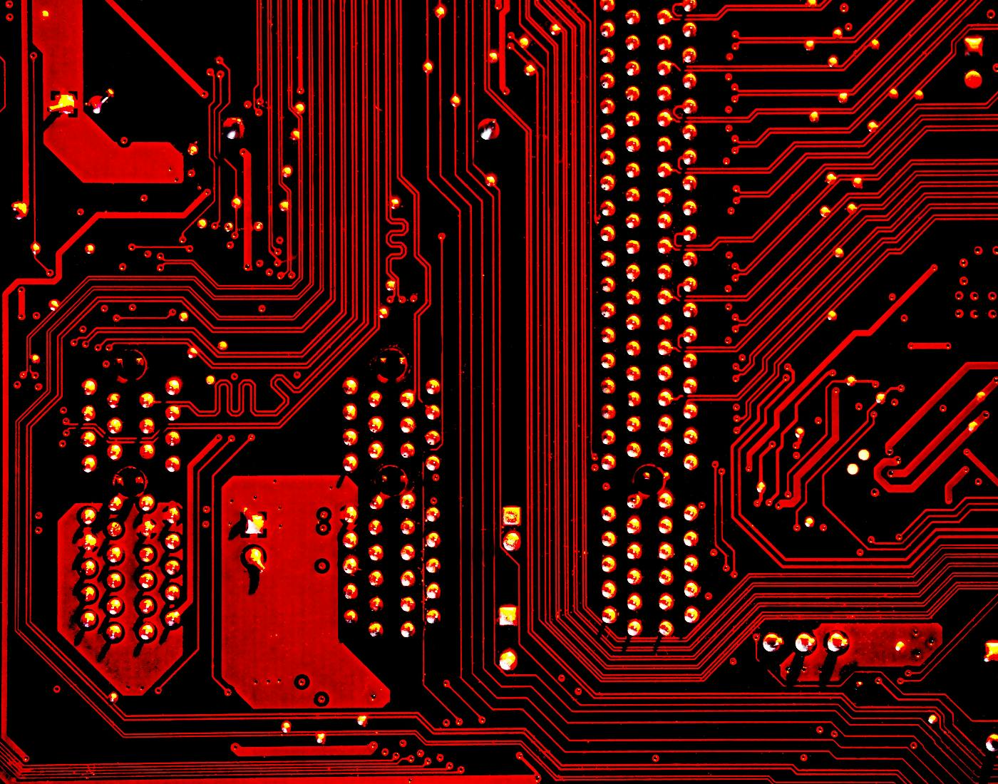 A red, black and gold circuit board