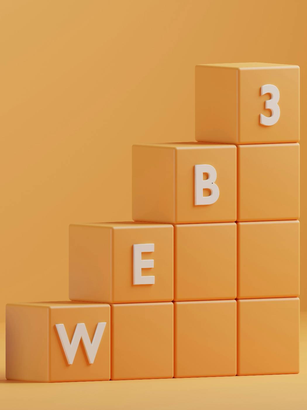 a 3D rendering of orange blocks with WEB3 on them
