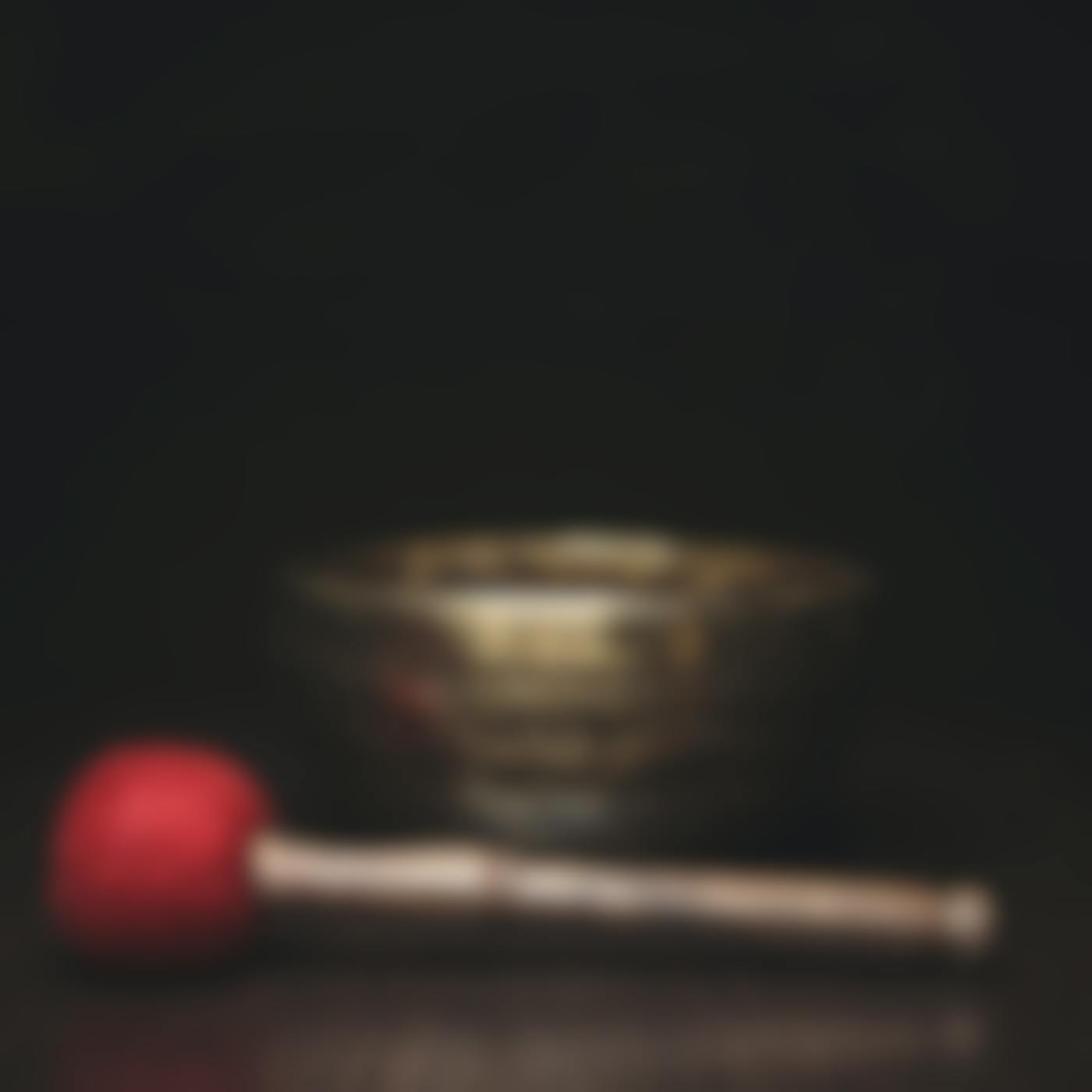 A Tibetan prayer bowl and hammer