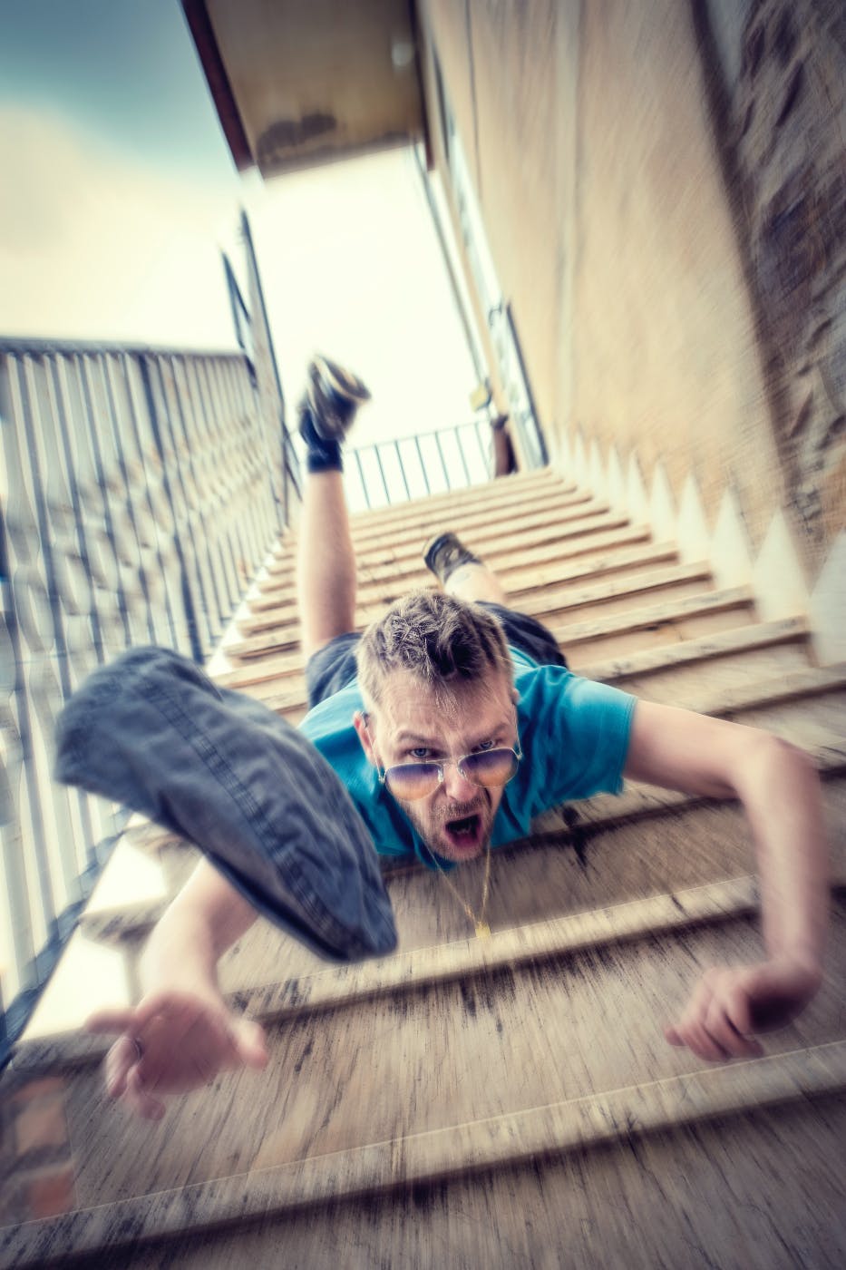 a man falling down a flight of stairs