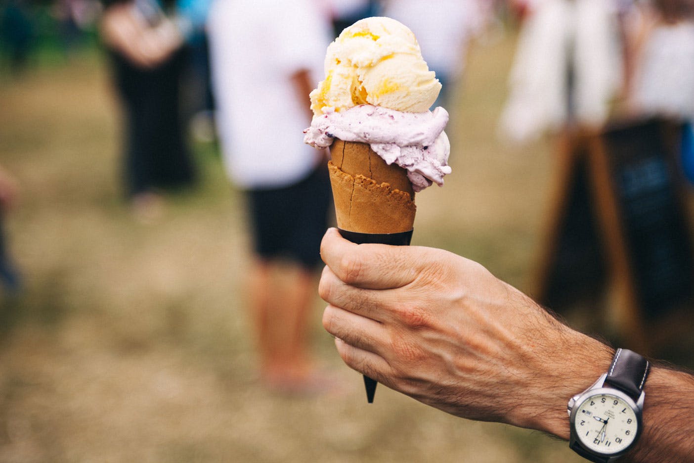holding ice cream cone