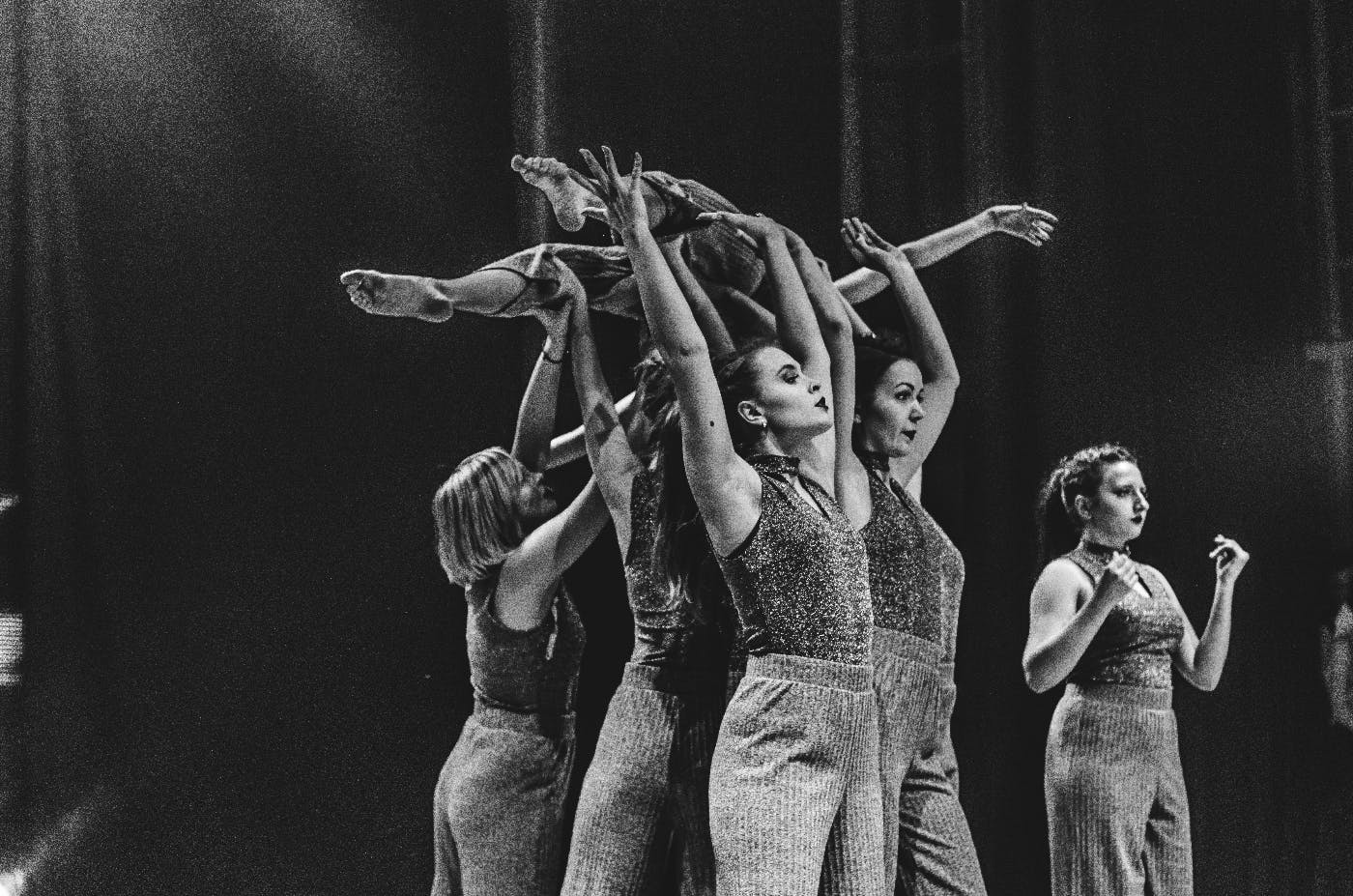 women performing greyscale