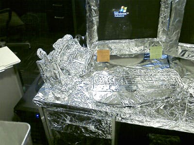 desk wrapped in foil