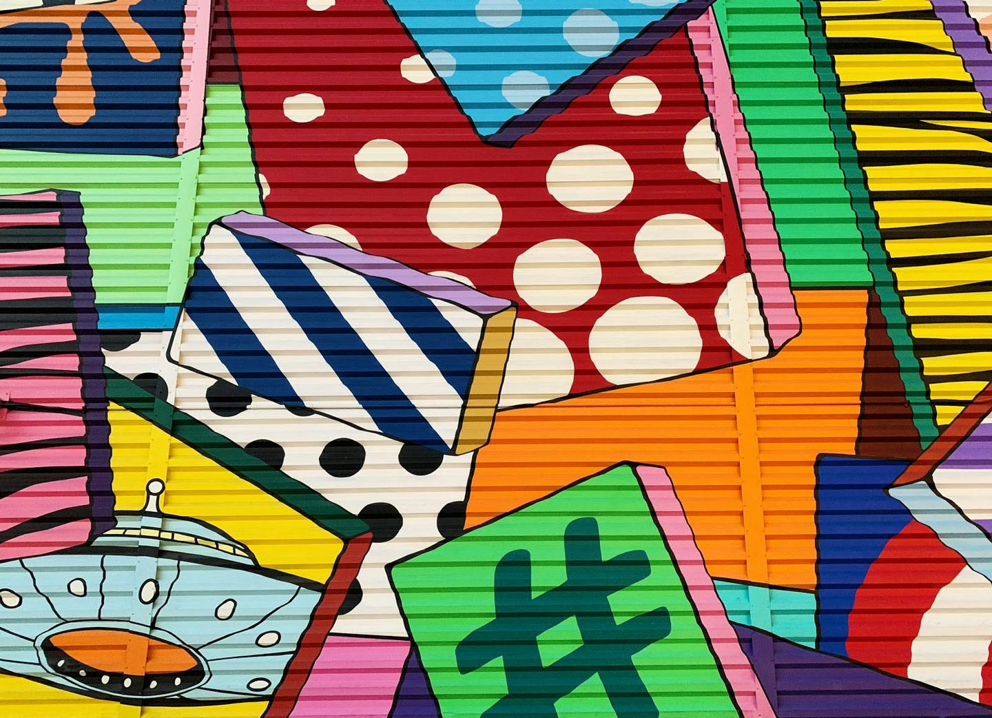 colorful graffitied patterned tiles in a collage