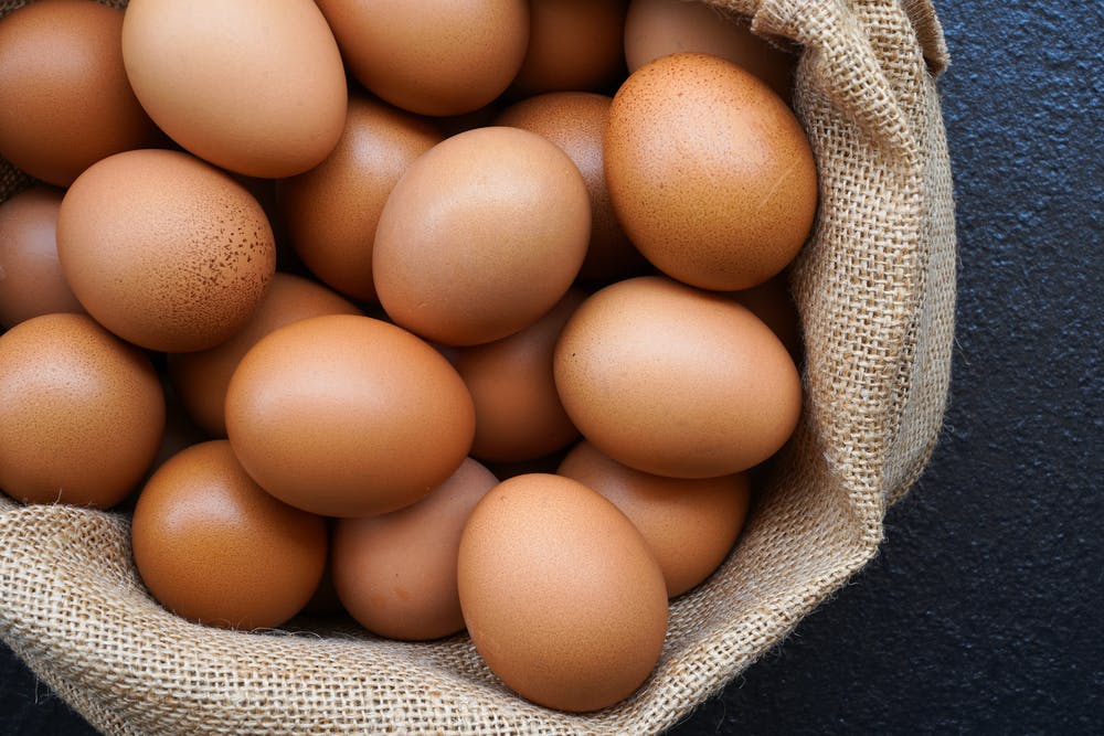 Follicle-stimulating hormone (FSH) eggs in a brown sack