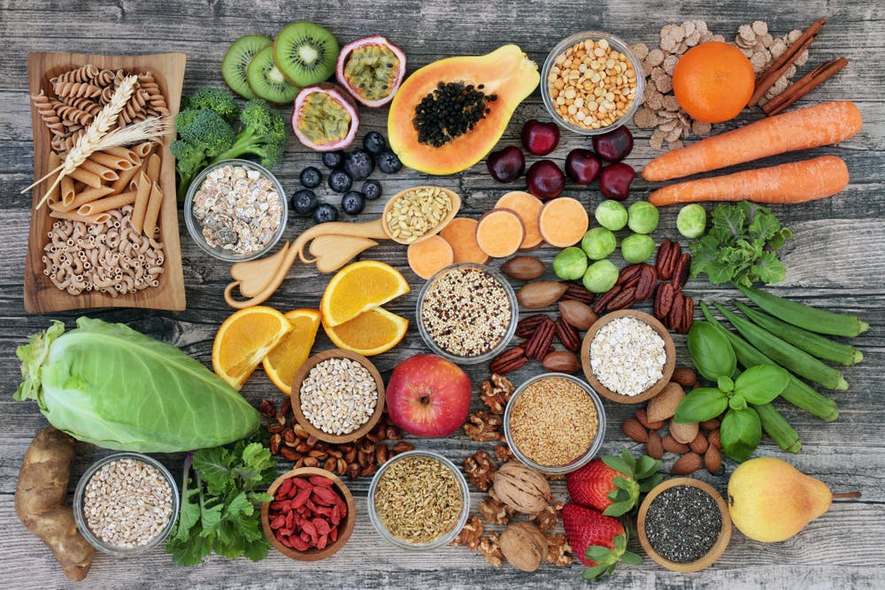 High-fibre foods — kiwis, blueberries, carrots, oranges, seeds
