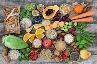 High-fibre foods — kiwis, blueberries, carrots, oranges, seeds