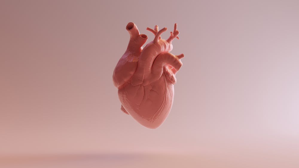 3D heart on pink background