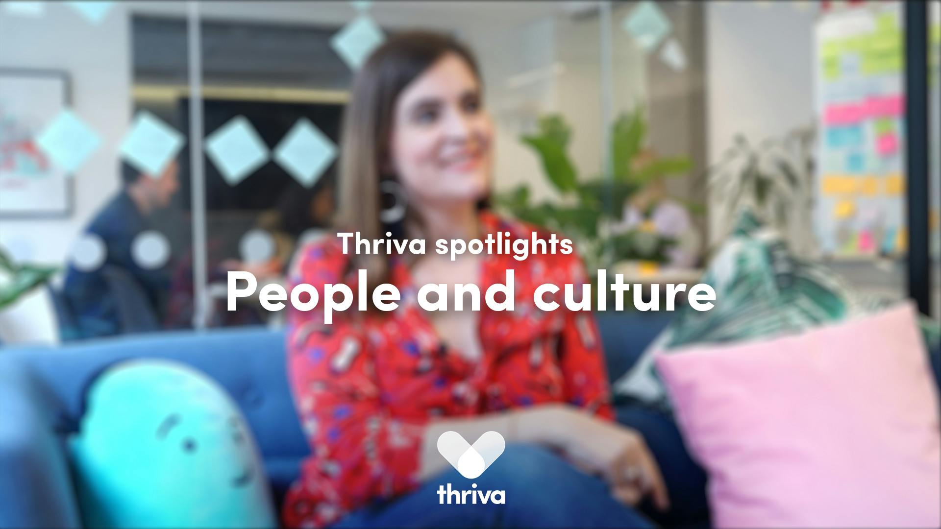 Gaby sitting on a sofa in the Thriva office