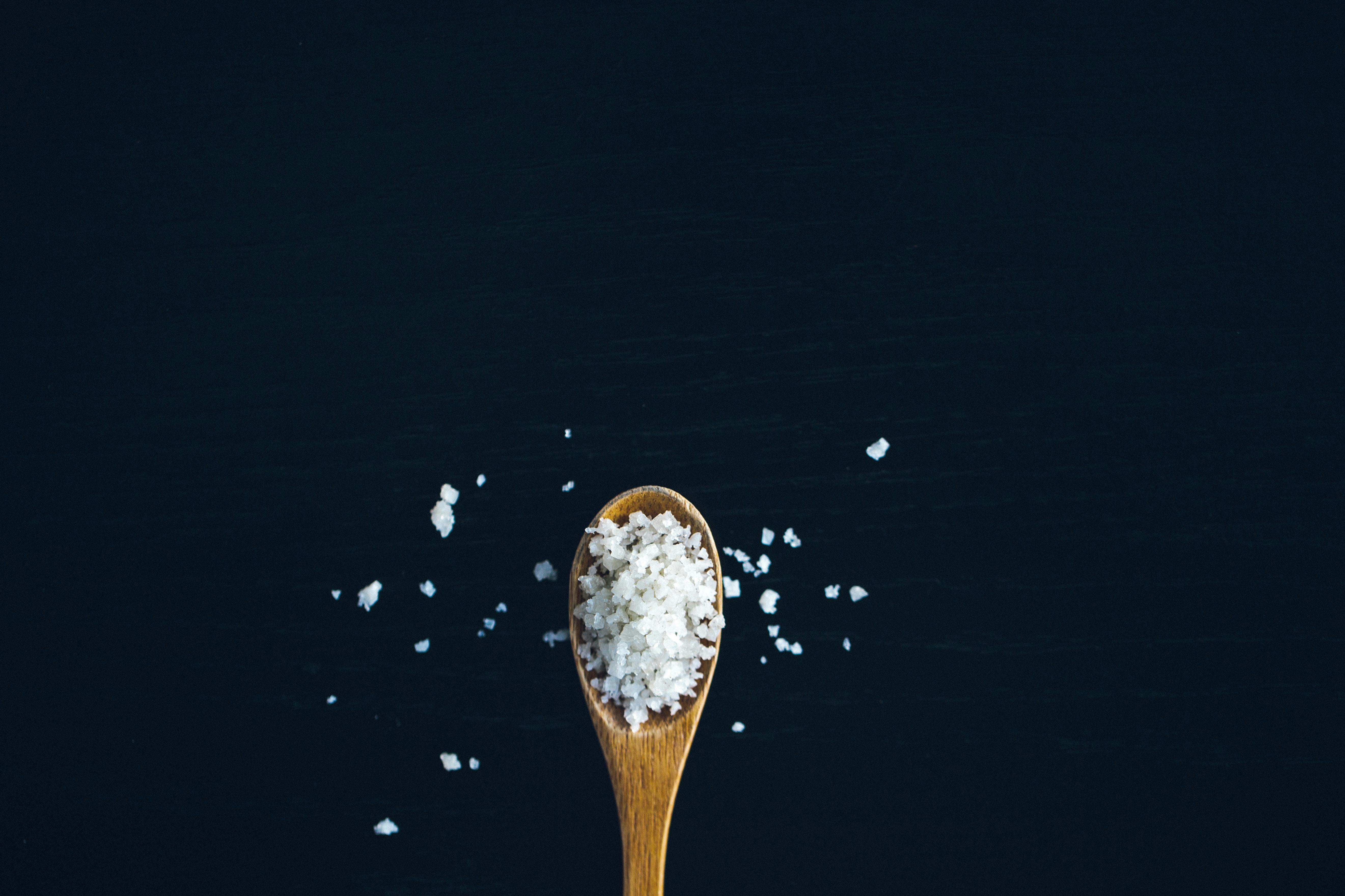 Salt in wooden spoon