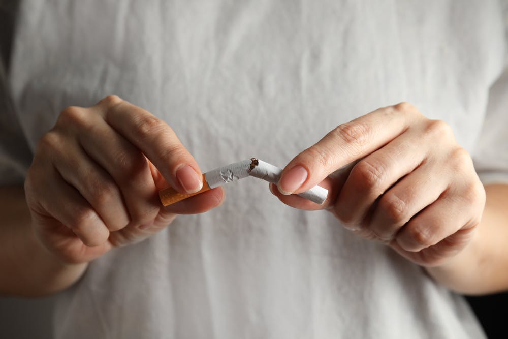 Tobacco cigarette split in half