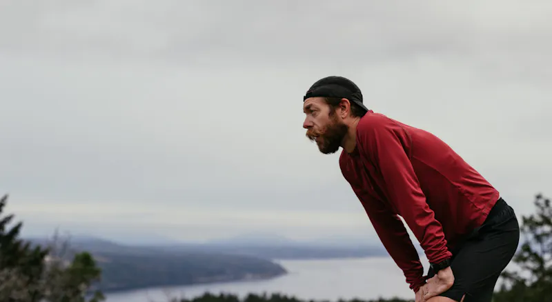 A visual representation of high cortisol as a man taking a deep breath.