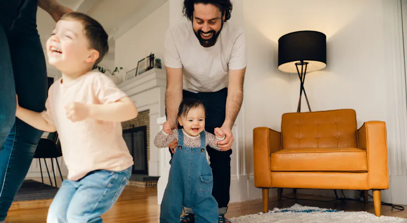 A man with his two children.