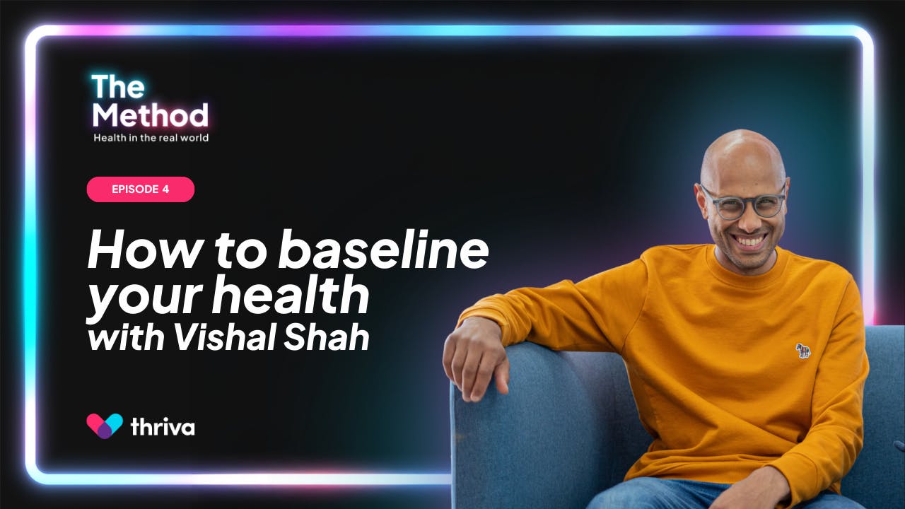 Dr Vishal Shah sitting on a sofa.