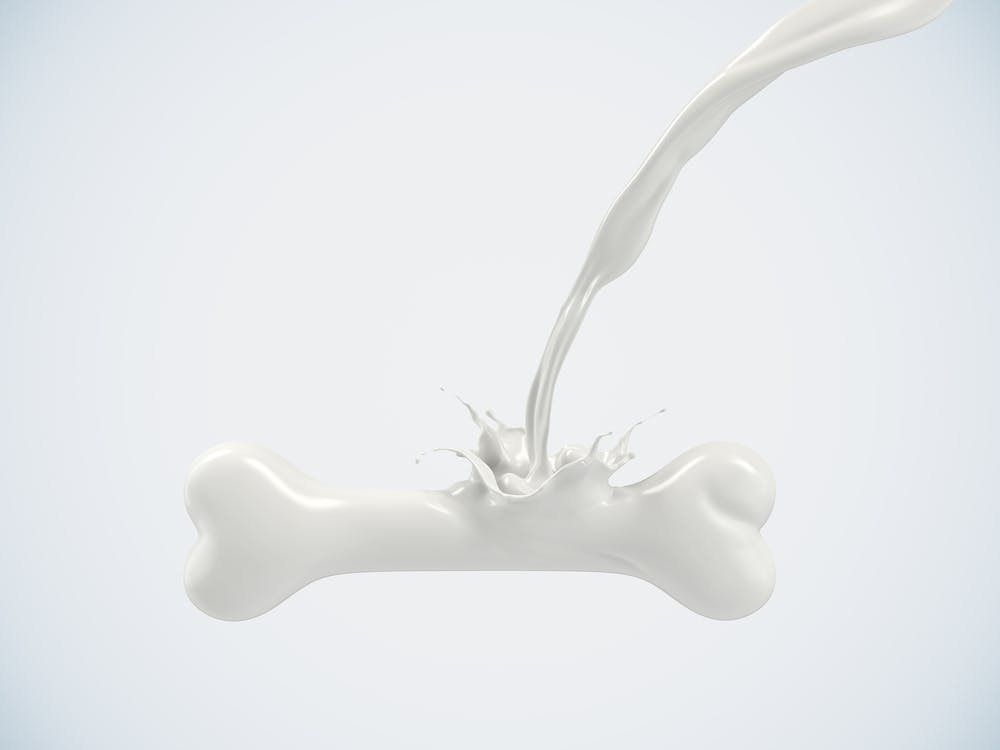 Milk pouring into bone