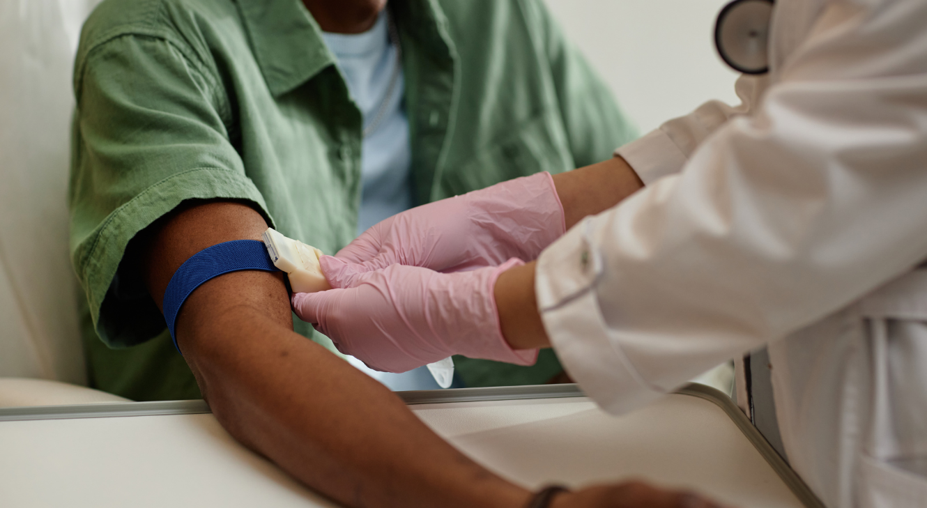 A person preparing for a blood draw.