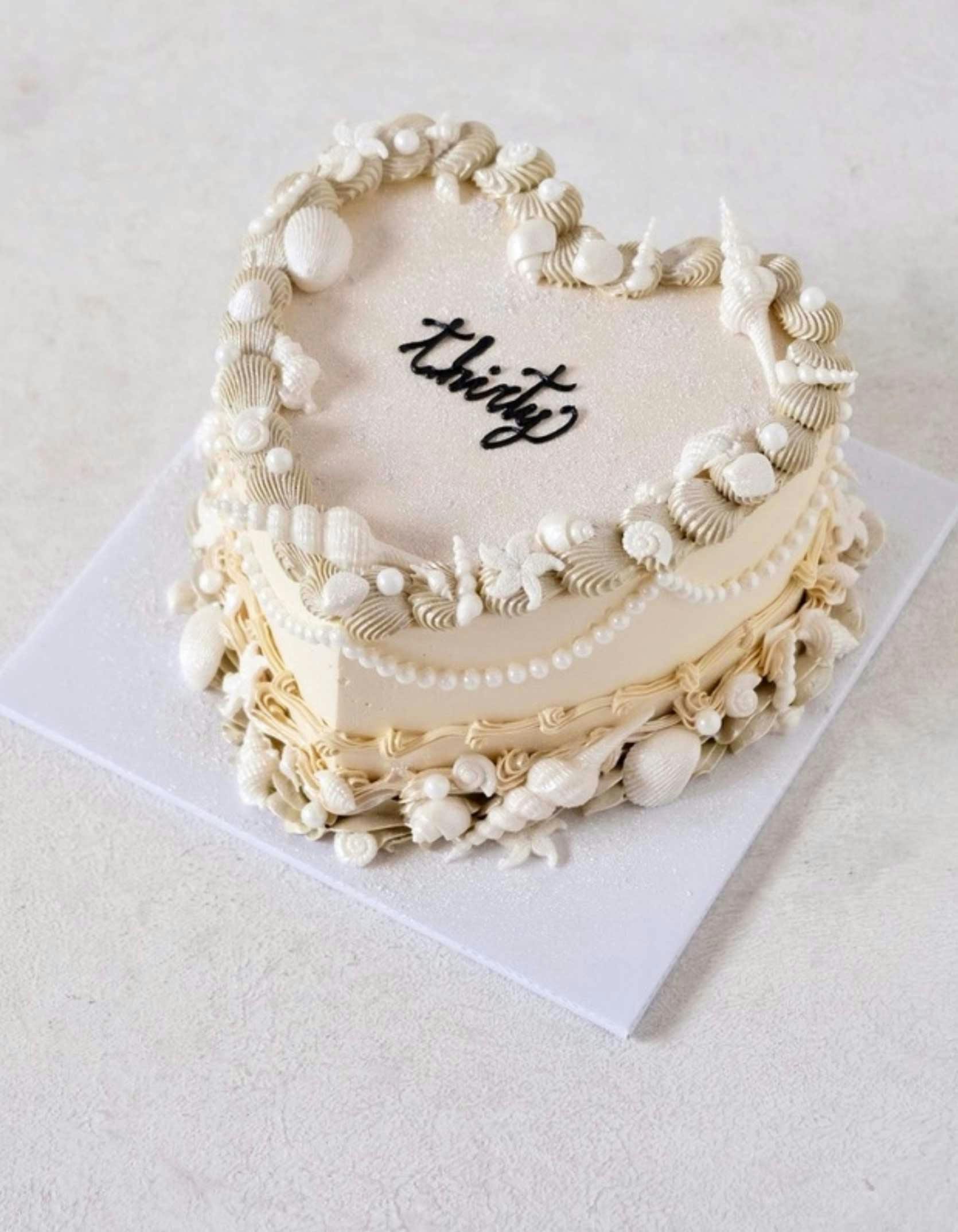 heart shaped royal vintage cake design with seashells