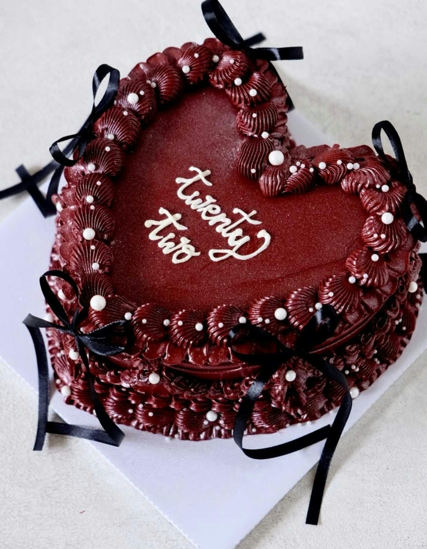 Burgendy heart shaped royal vintage cake design with glitter