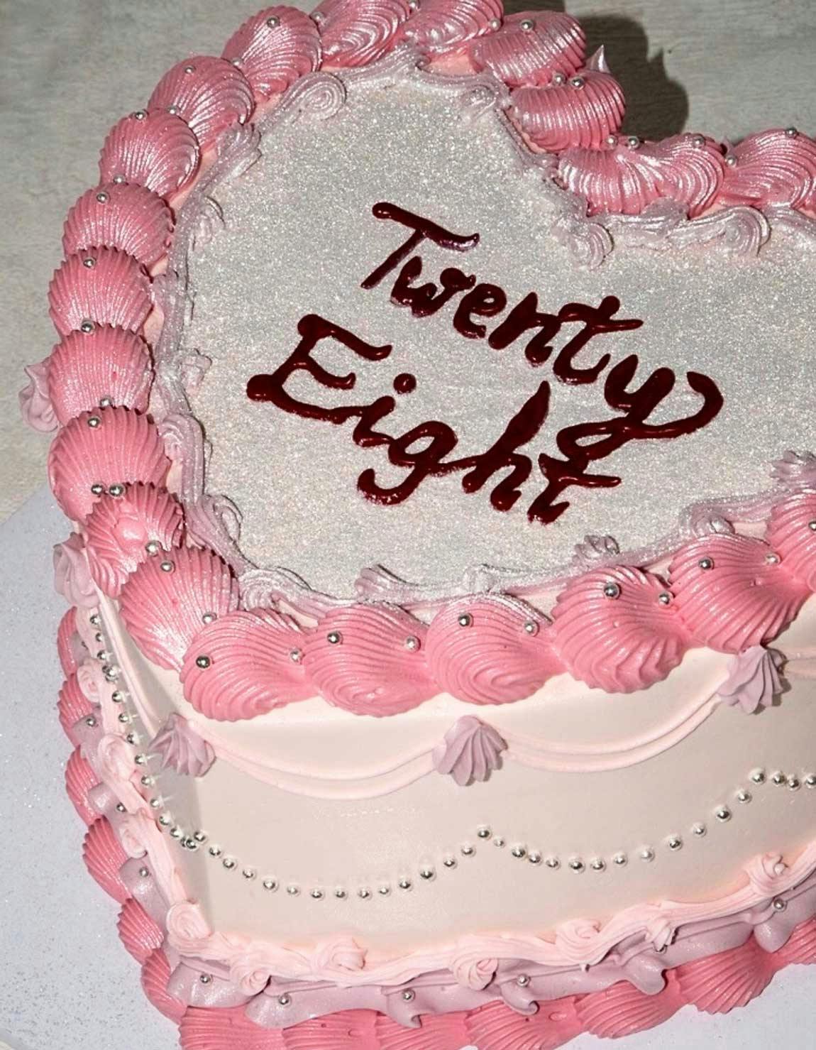 Pink heart shaped royal vintage cake design with glitter