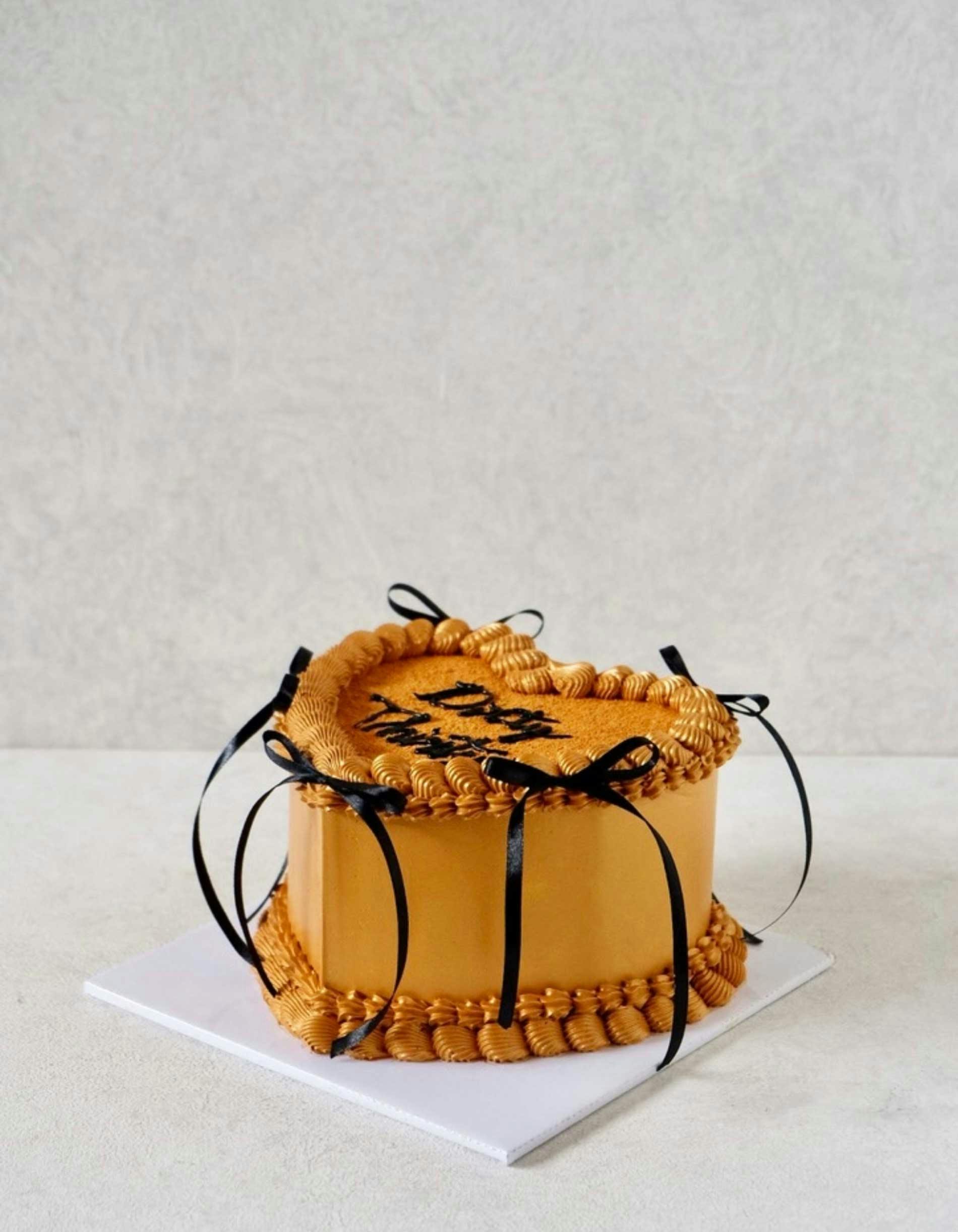 Heart shaped royal vintage cake design with glitter